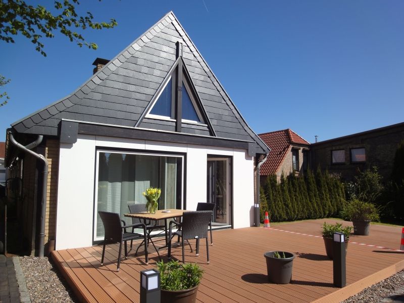Ferienhaus Dat lütte Nordlicht Huus mit Holzterrasse und Sitzgruppe in Kappeln